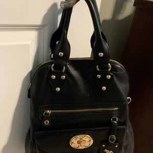 This is an Emma Fox satchel in genuine leather.